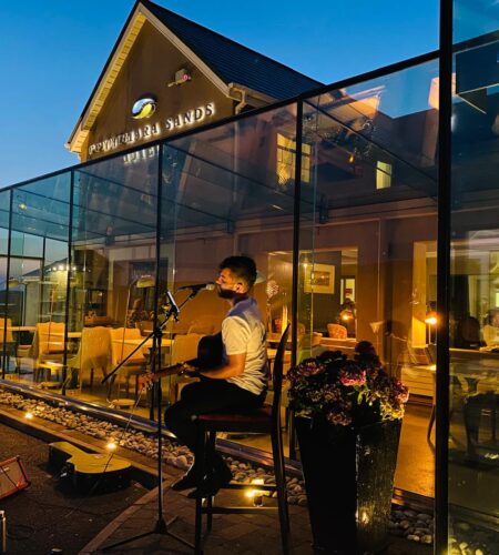 Brian Sings outside Hotel Glass Room